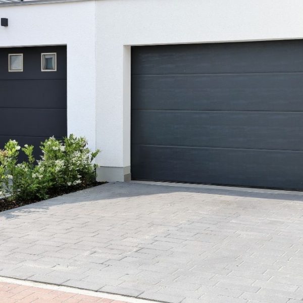 Steel vs Aluminum vs Wood: Which Garage Door Material Actually Lasts?