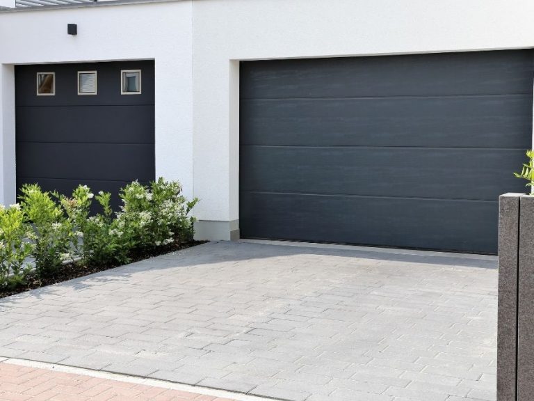 Steel vs Aluminum vs Wood: Which Garage Door Material Actually Lasts?